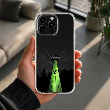 Cartoon alien abduction scene with UFO on phone case — Lifestyle