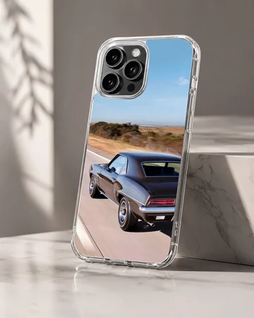 American muscle car in motion under clear blue skies phone case — Hero