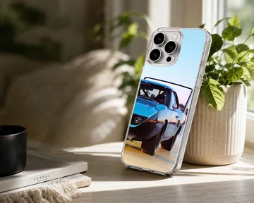 American muscle car speeding along a road, phone case design. — Lifestyle
