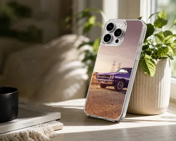 American muscle car artwork on phone case, featuring a vintage car against a sunset backdrop. — Lifestyle