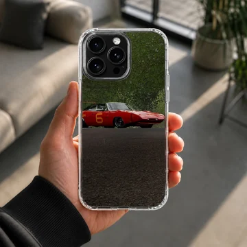 Red classic American muscle car on phone case — Lifestyle