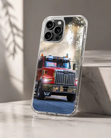 American truck driving through a forest, depicted on phone case — Hero