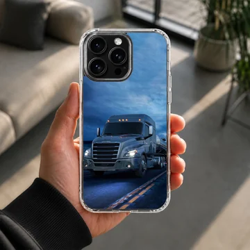 American truck driving on a highway under a blue sky, phone case — Lifestyle