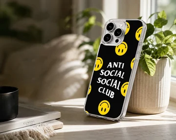 Anti Social Social Club phone case with bold typography and smiley faces — Lifestyle