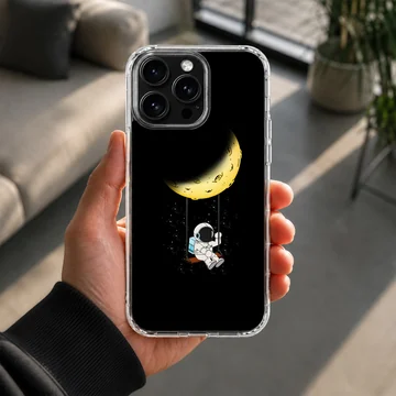 Astronaut swinging from crescent moon on phone case — Lifestyle