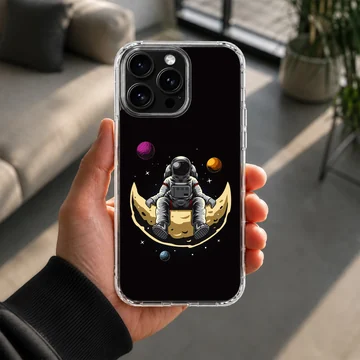 Astronaut sitting on a crescent moon with planets, phone case — Lifestyle