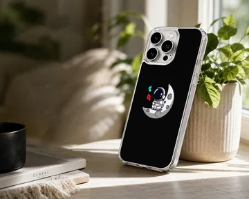Astronaut floating on a moon with a black background phone case — Lifestyle