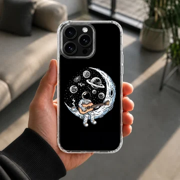 Astronaut playing guitar surrounded by planets on a phone case — Lifestyle