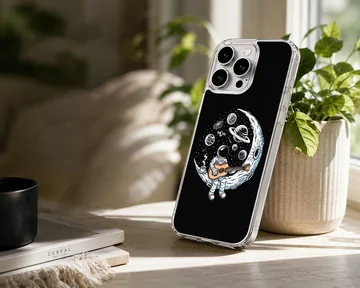 Astronaut playing guitar surrounded by planets on a phone case — Lifestyle