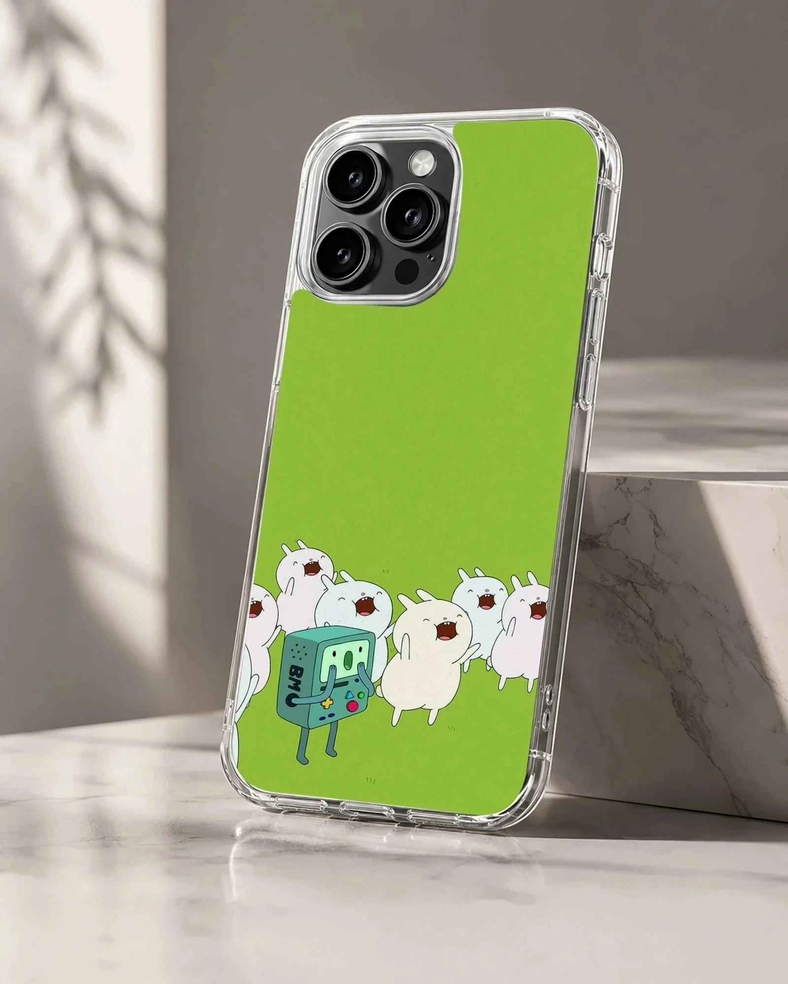 BMO phone case with cartoon characters on green background