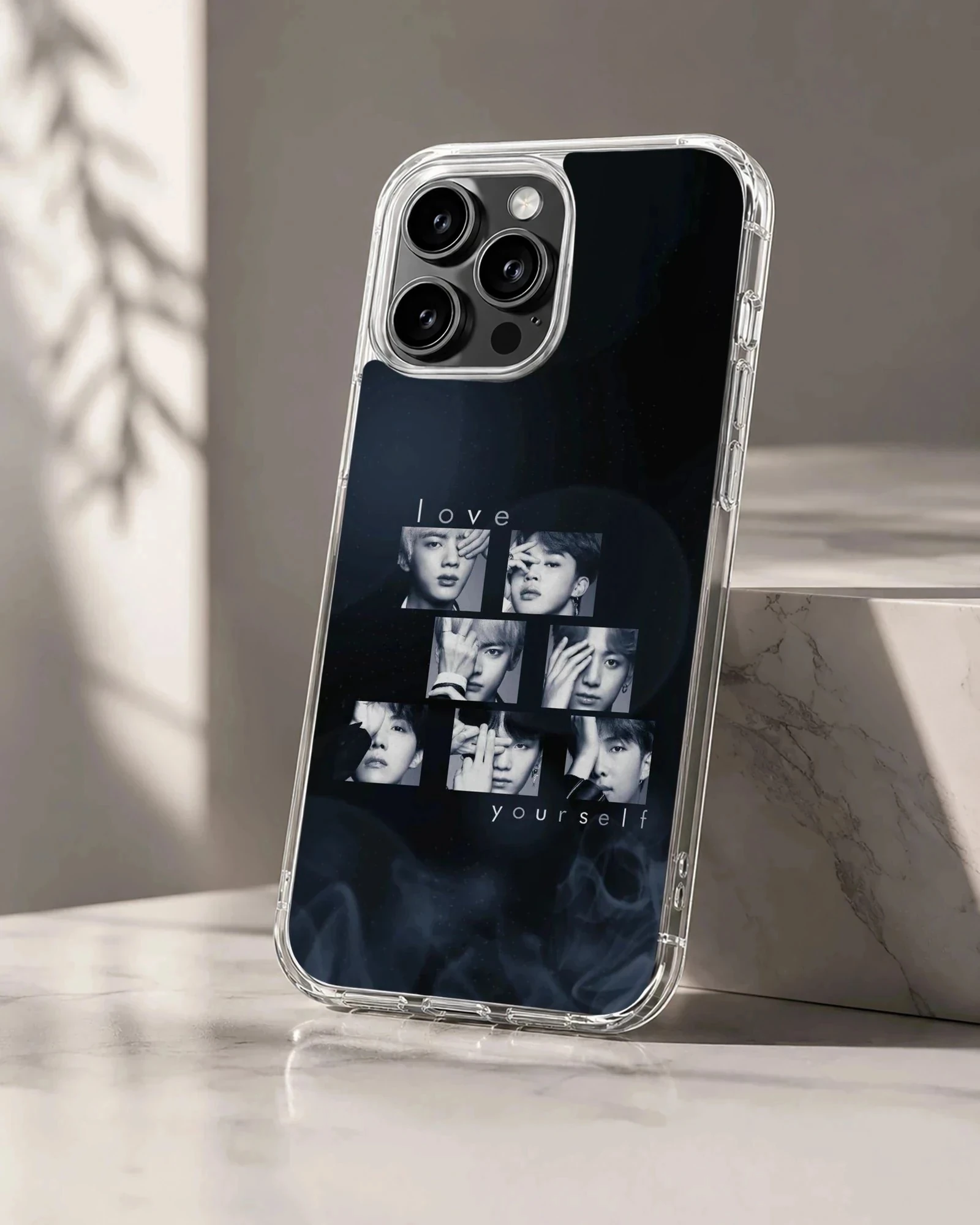 BTS group collage on a black phone case