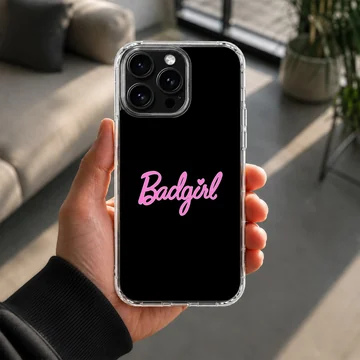 Black phone case with bold pink 'Badgirl' typography — Lifestyle