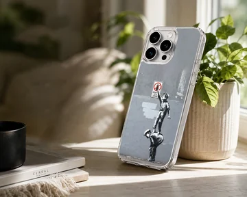 Bansky graffiti artwork on phone case, modern minimalist design — Lifestyle