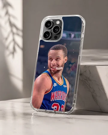 Dynamic basketball player in action, wearing a blue and yellow jersey on a phone case — Hero