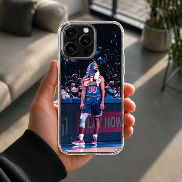 Dynamic basketball star design on phone case showing player in action. — Lifestyle