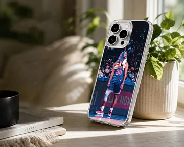 Dynamic basketball star design on phone case showing player in action. — Lifestyle