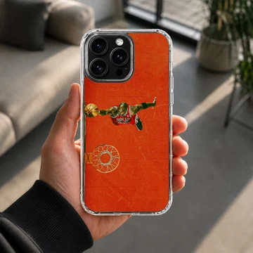 Dynamic basketball hero in action on orange background phone case — Lifestyle