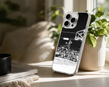 Dynamic basketball dunk captured in black and white on phone case — Lifestyle