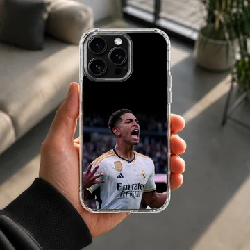 Dynamic football player celebrating in Bellingham phone case. — Lifestyle