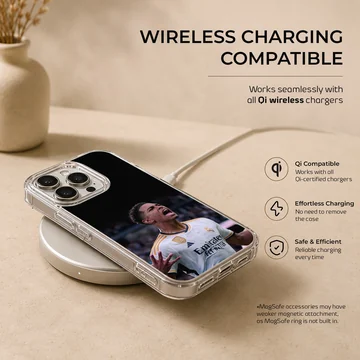 Dynamic football player celebrating in Bellingham phone case. — Charging
