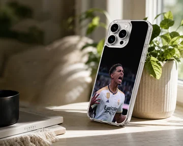 Dynamic football player celebrating in Bellingham phone case. — Lifestyle