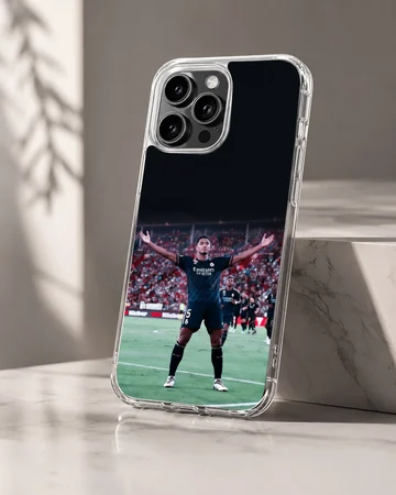 Football player Bellingham celebrating on the field, phone case — Hero