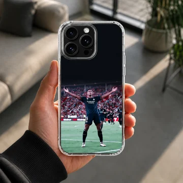 Football player Bellingham celebrating on the field, phone case — Lifestyle