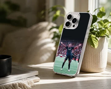 Football player Bellingham celebrating on the field, phone case — Lifestyle