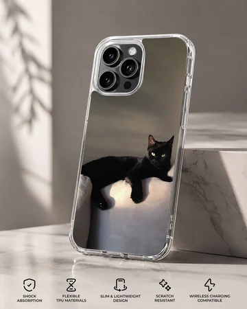 Black cat lounging in serene setting on phone case — Specs
