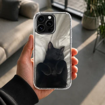 Black cat lounging on soft fabric design phone case — Lifestyle