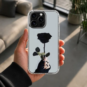Black flower photograph with hand holding a rose phone case — Lifestyle