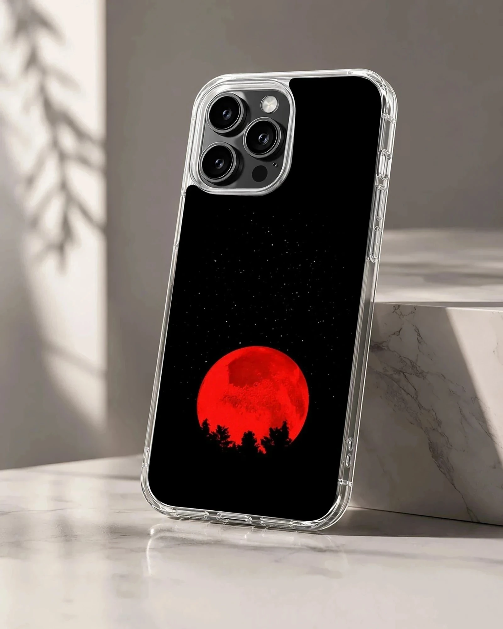 Blood moon with surreal nightscape design on phone case