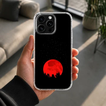 Blood moon with surreal nightscape design on phone case — Lifestyle