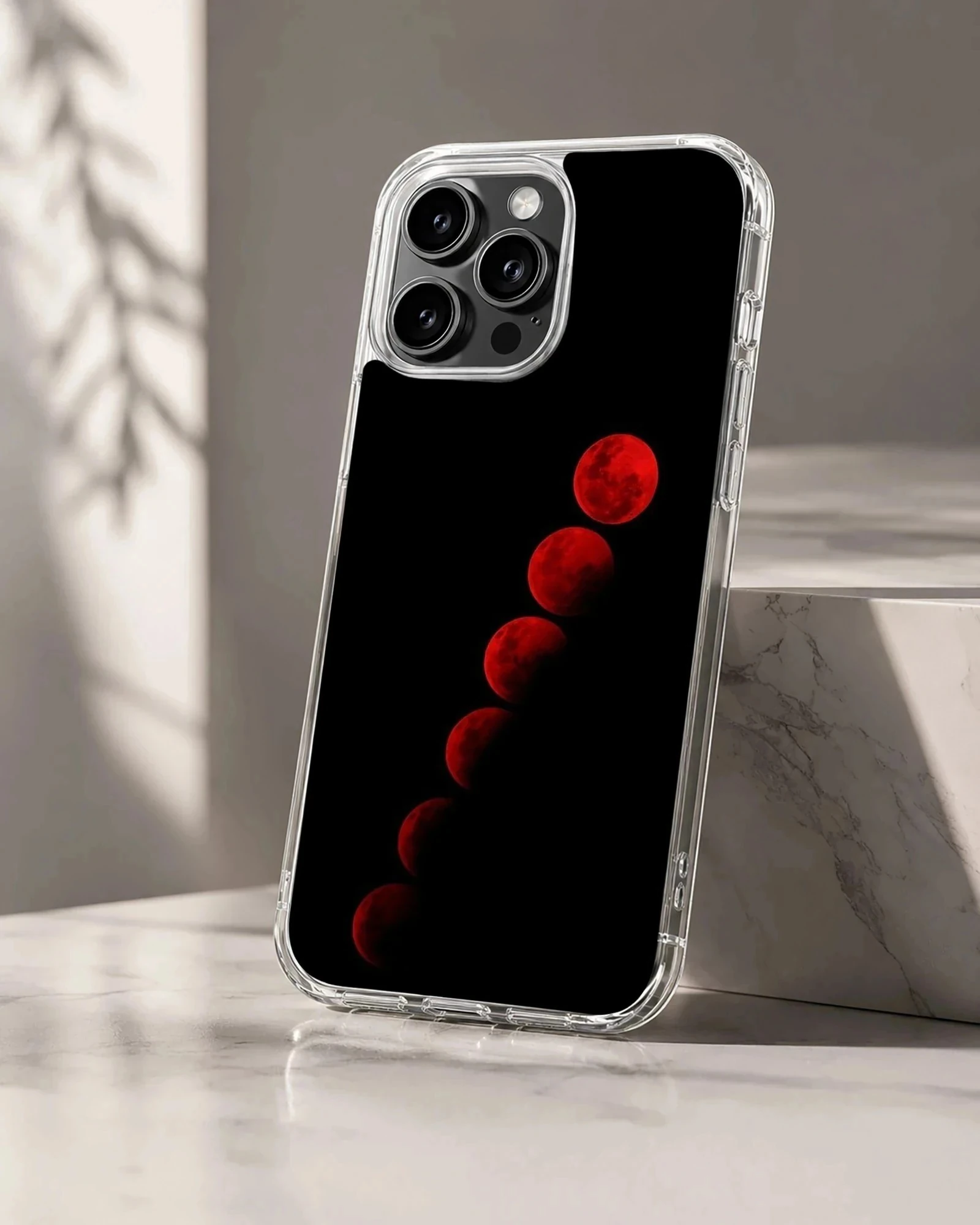 Blood moon sequence with surreal lunar imagery on phone case