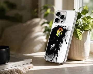 Abstract depiction of Bob Marley with splashes of black and green on phone case — Lifestyle