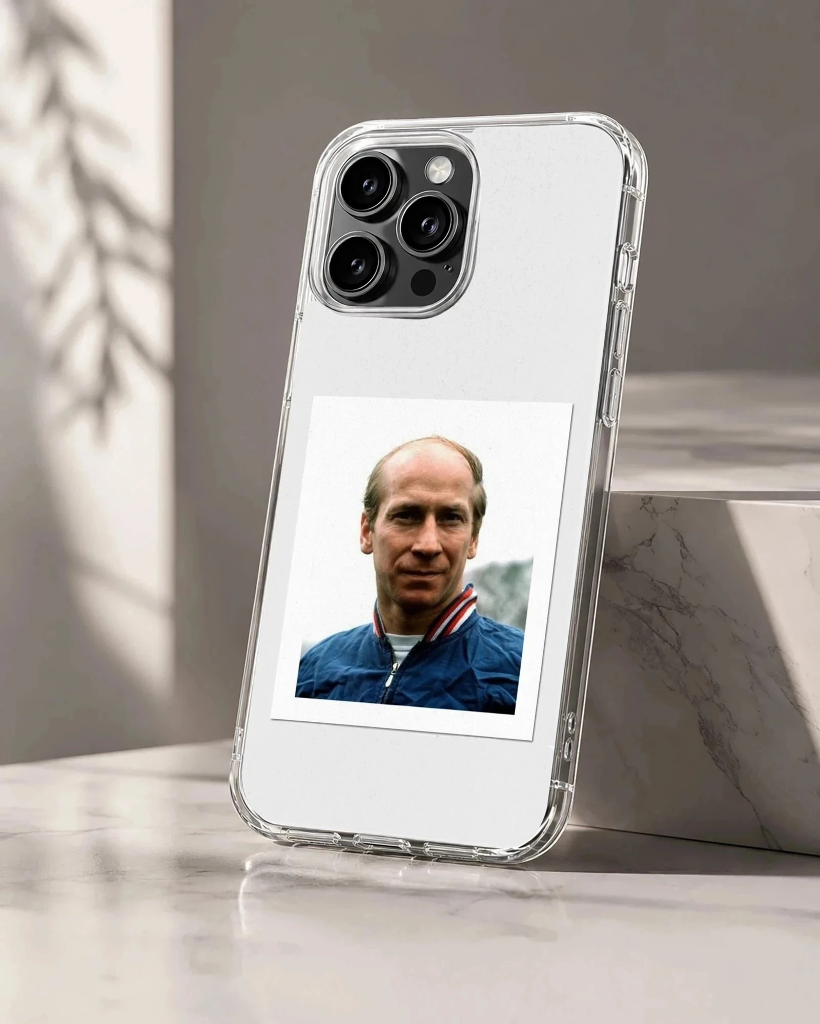 Photographic portrait of Bobby Charlton on phone case