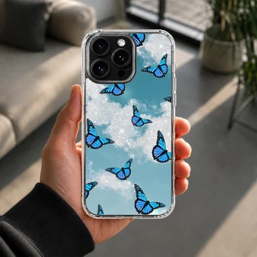 Blue butterflies in a dreamlike sky on phone case — Lifestyle