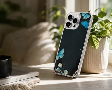 Phone case with a design of blue butterflies on a black background. — Lifestyle