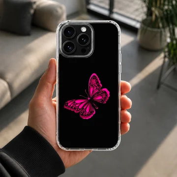 Phone case with a vibrant pink butterfly on a black background — Lifestyle