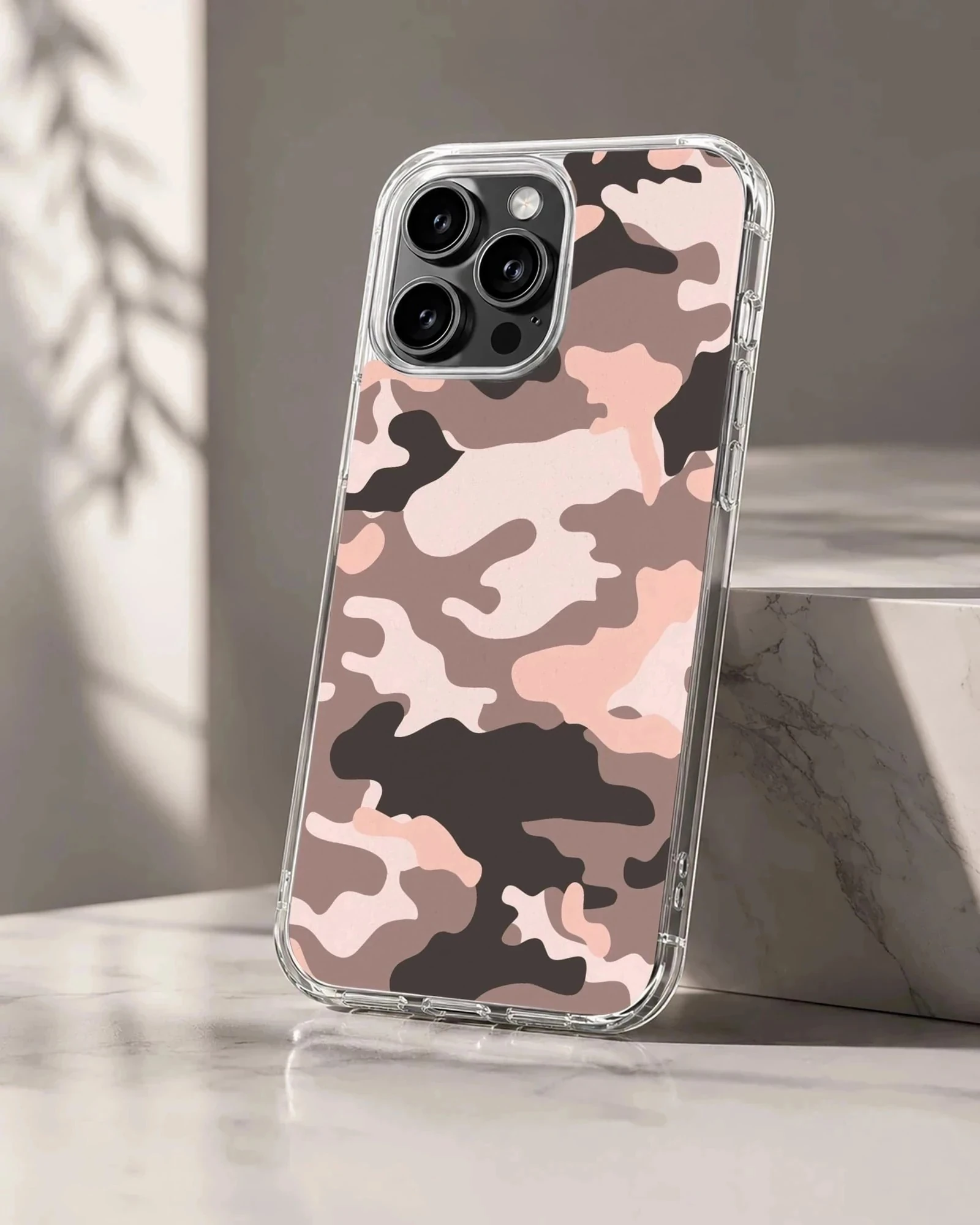 Pink and brown camouflage pattern printed on a matte phone case