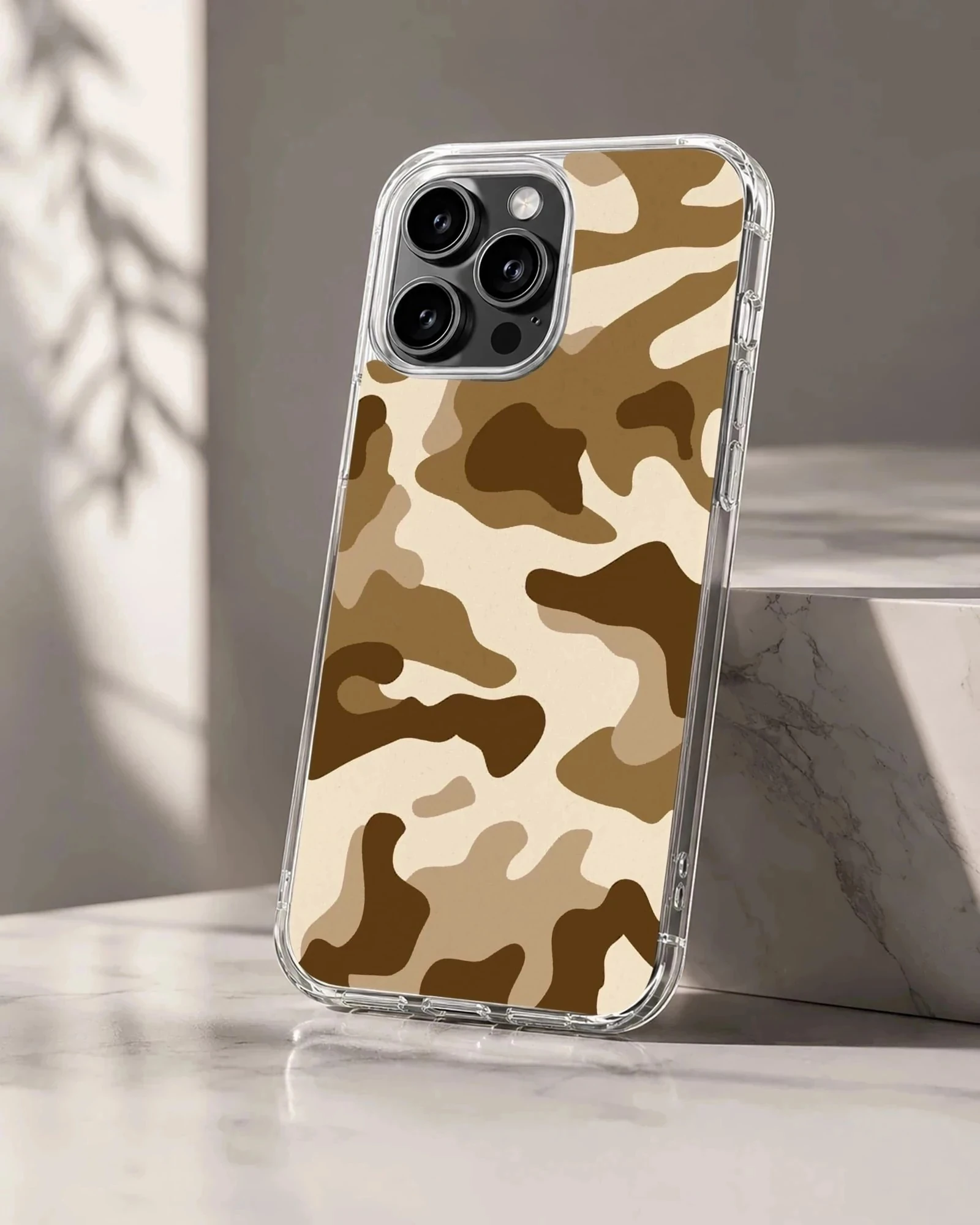 A soft TPU snap phone case printed with a brown and tan camouflage pattern