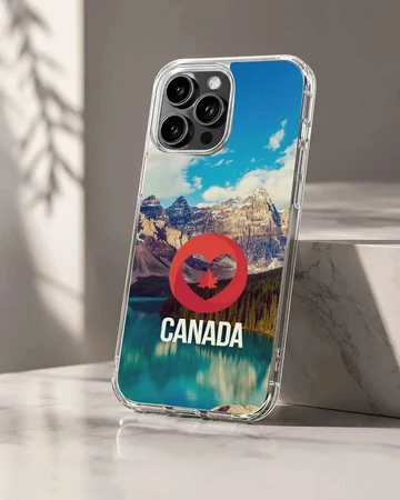 Scenic mountain and lake view with a red heart and maple leaf symbol above the word CANADA on a phone case