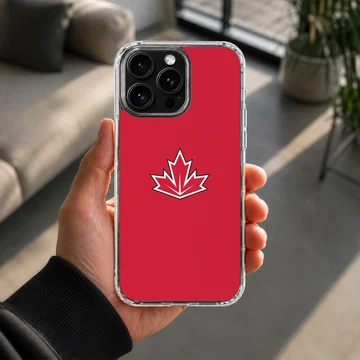 Vibrant red phone case featuring a stylized white and black bordered maple leaf symbol inspired by the Canadian flag — Lifestyle