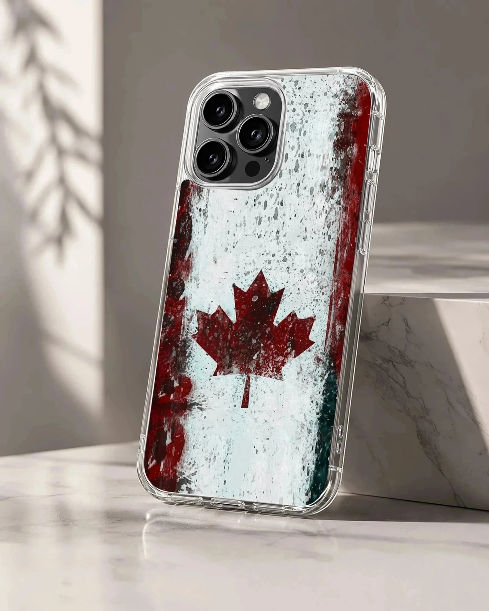 Distressed Canadian flag with a red maple leaf on a textured white background phone case