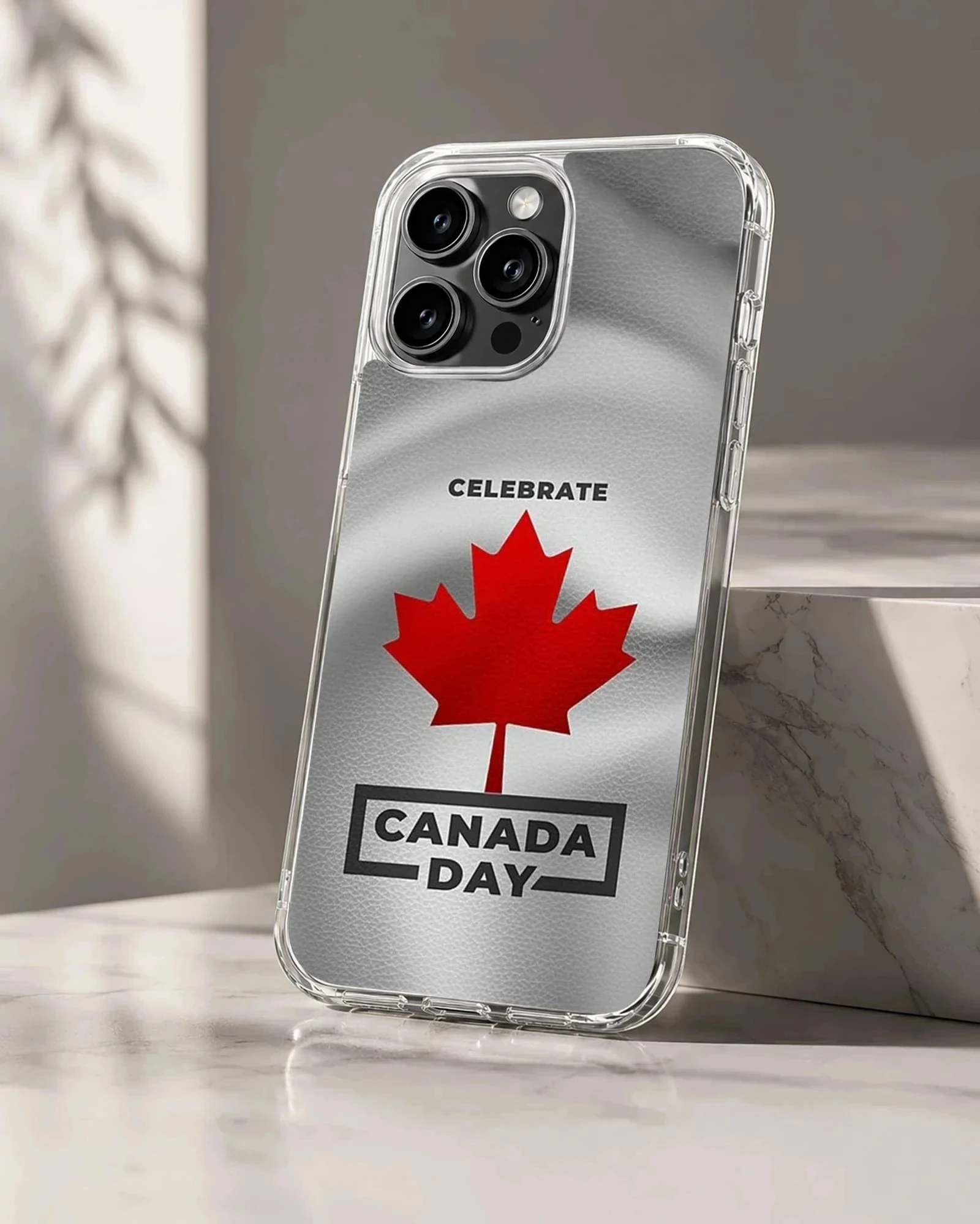 Canada Day maple leaf design in red and black typography on a textured white background phone case