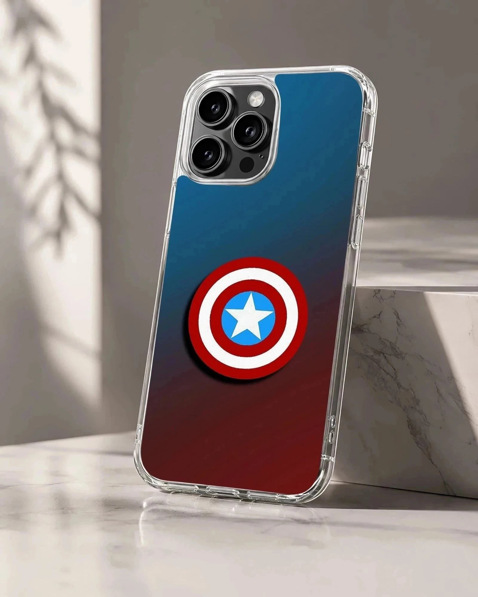 Captain America shield graphic on a blue and red gradient phone case