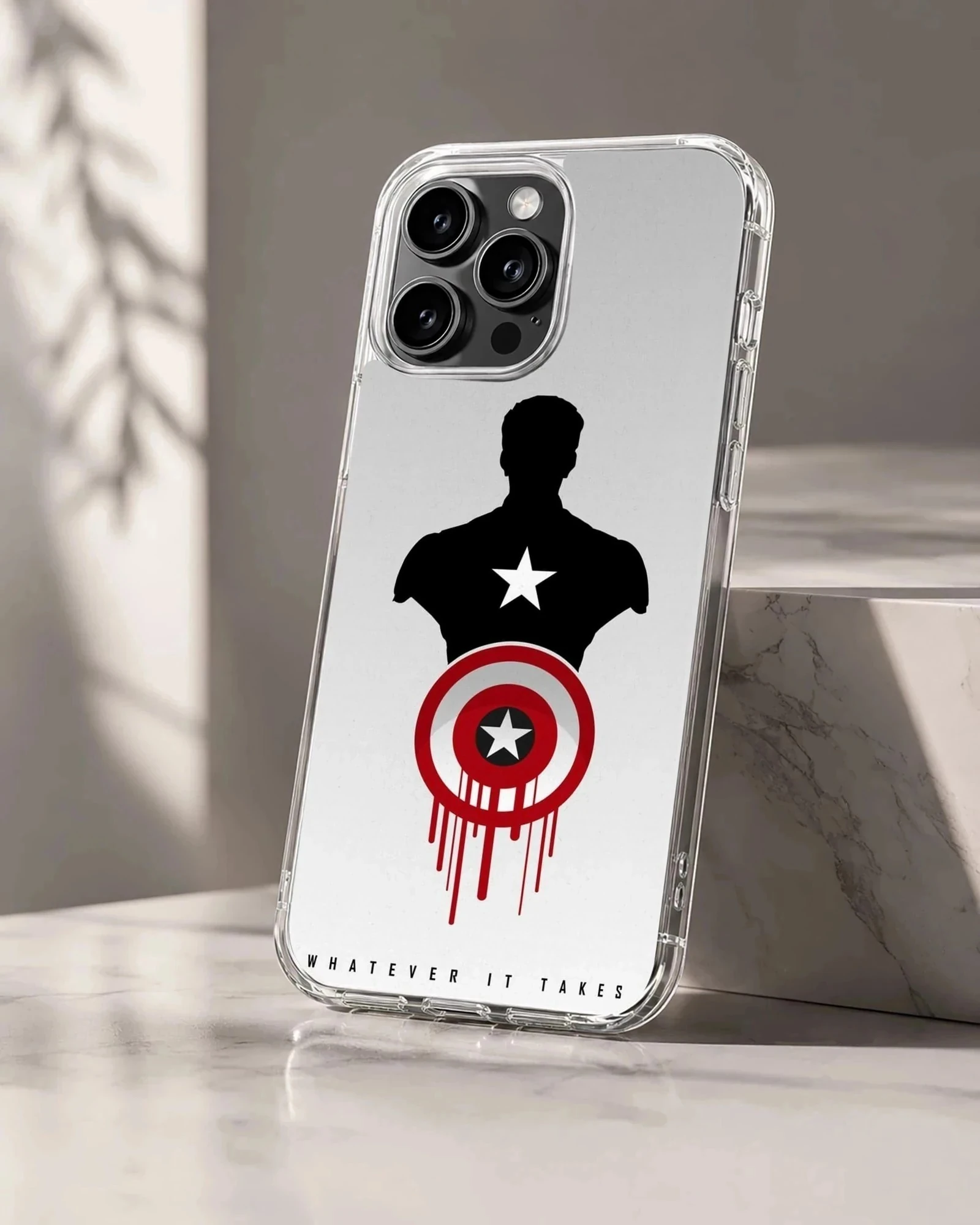 A phone case featuring a black hero silhouette, red and white shield graphic, and the words whatever it takes.