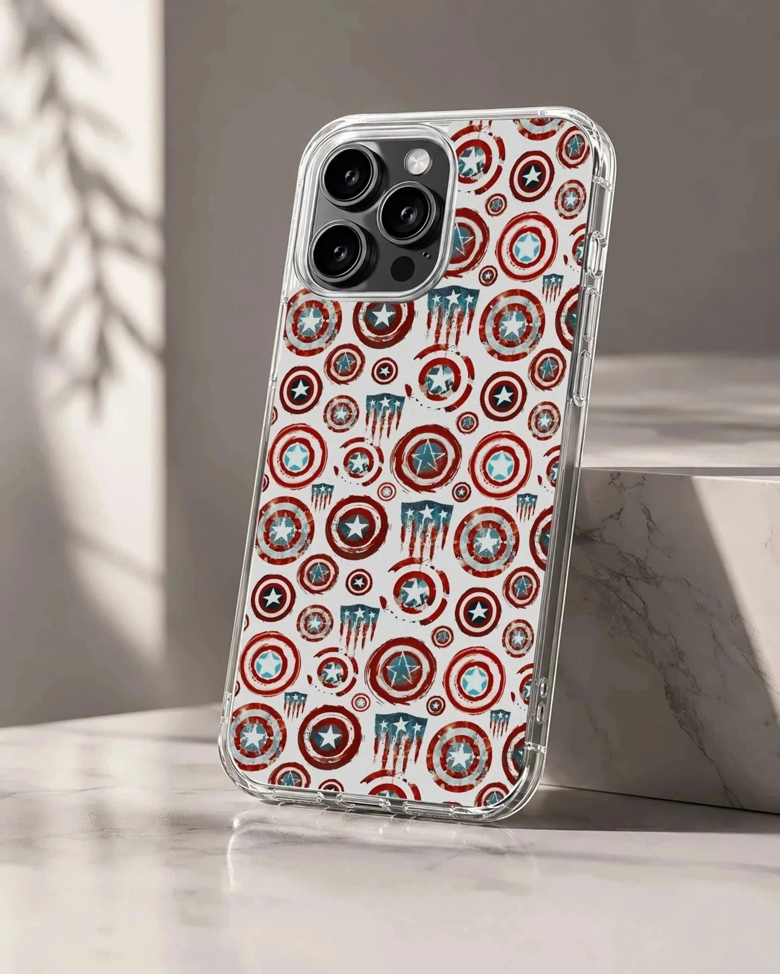 A phone case featuring a repeating graphic pattern of vintage-style red, white, and blue star shields.