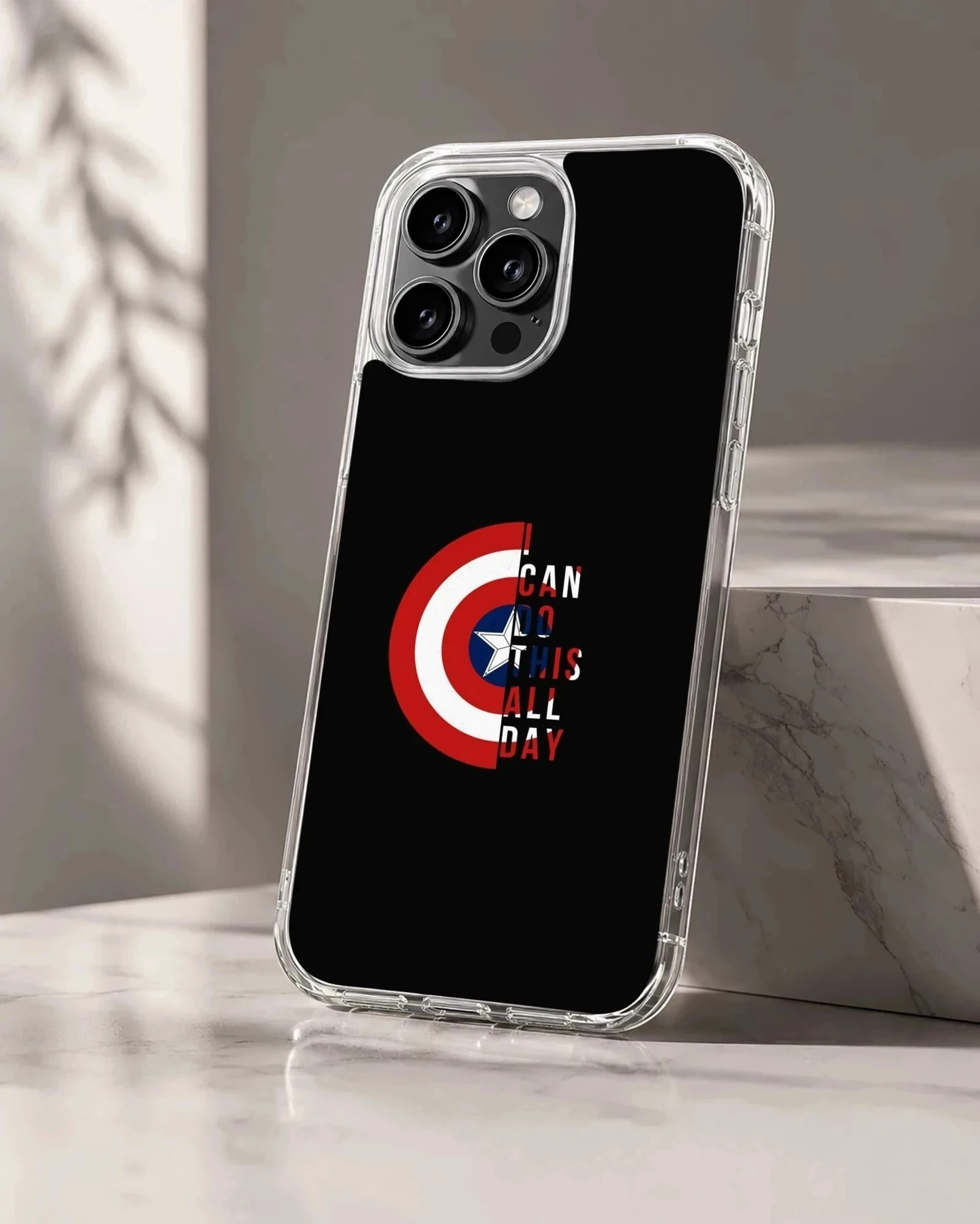 Captain America shield graphic with bold quote typography on a black phone case