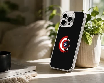 Captain America shield graphic with bold quote typography on a black phone case — Lifestyle